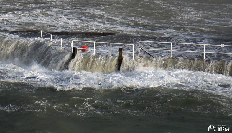 2 February 2017 - Banjo Pier braving the strong southerly winds half an hour after high tide this morning © Ian Foster / fozimage