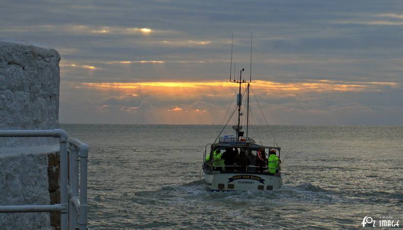 11 February 2017 - Out the Blue fishermen head out into Looe bay at sunrise © Ian Foster / fozimage