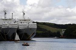 UECC car transporters moored by the King Harry ferry