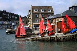 Preparing the sail boats on the seafront, East Looe