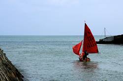 Sailing out into Looe Bay