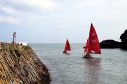 Sailing out into Looe Bay