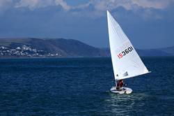 Sailing out into Looe Bay