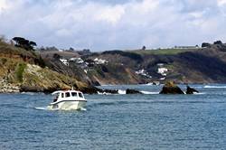 Glass bottom boat by Tom Barber's rock