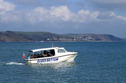 Glass bottom boat by Tom Barber's rock