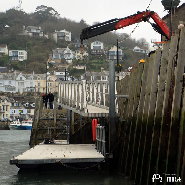 16 March 2017 - Hoisting the landing pontoon access ramp into position © Ian Foster / fozimage