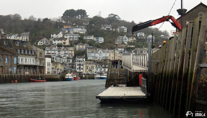 16 March 2017 - Hoisting the landing pontoon access ramp into position © Ian Foster / fozimage