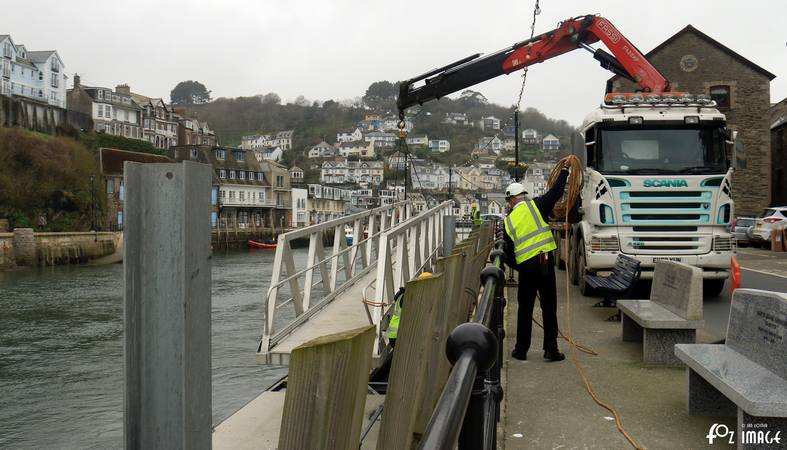 16 March 2017 - Hoisting the landing pontoon access ramp into position © Ian Foster / fozimage