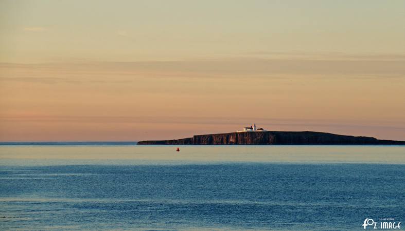 Sunset over Seahouses, Inner farne and Bamburgh Castle