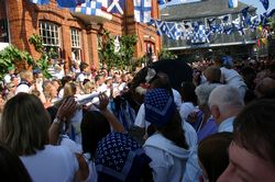 Padstow institute - Blue Ribbon Oss appears in the street