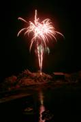 Polperro fireworks over Peak rock and the harbour