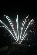 Polperro fireworks over Peak rock and the harbour