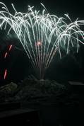 Polperro fireworks over Peak rock and the harbour