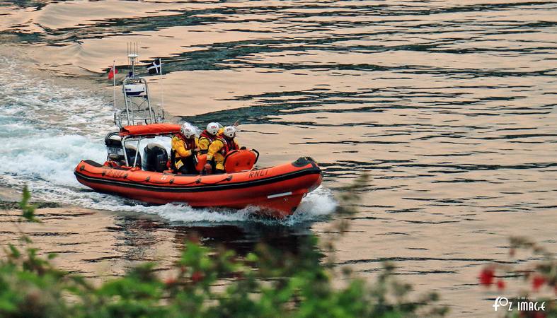 Looe RNLI Atlantic 85 launching at sunset